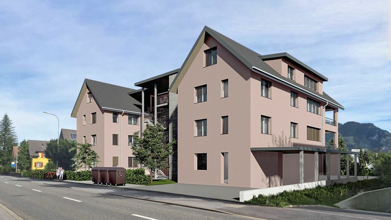 Mehrfamilienhaus mit geneigtem Dach