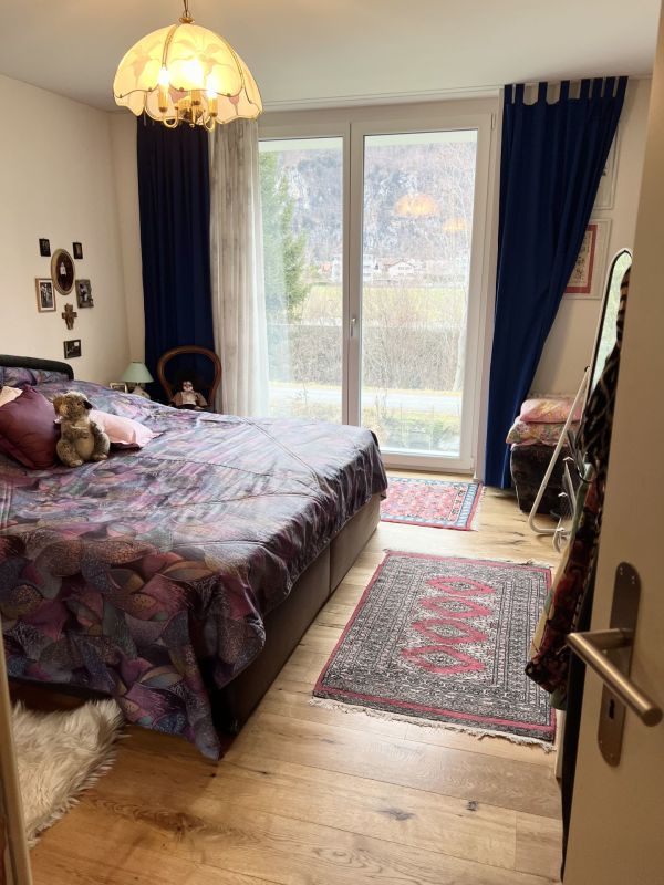 Schlafzimmer mit Balkonzugang