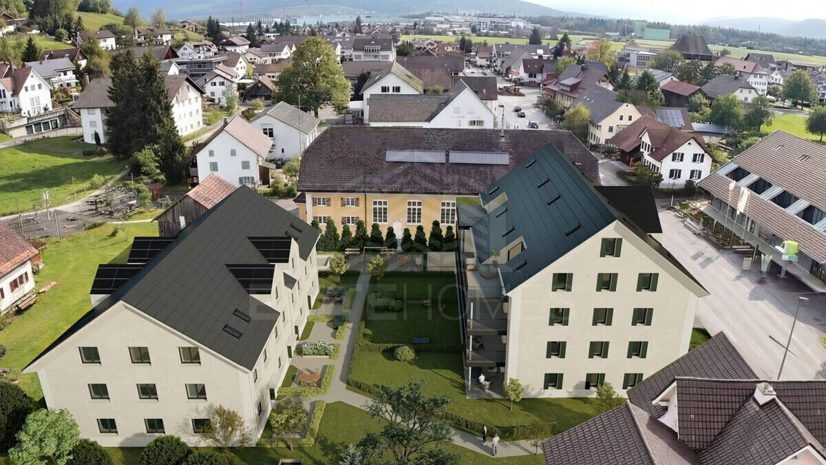 Luftaufnahme einer Wohnanlage im Ort