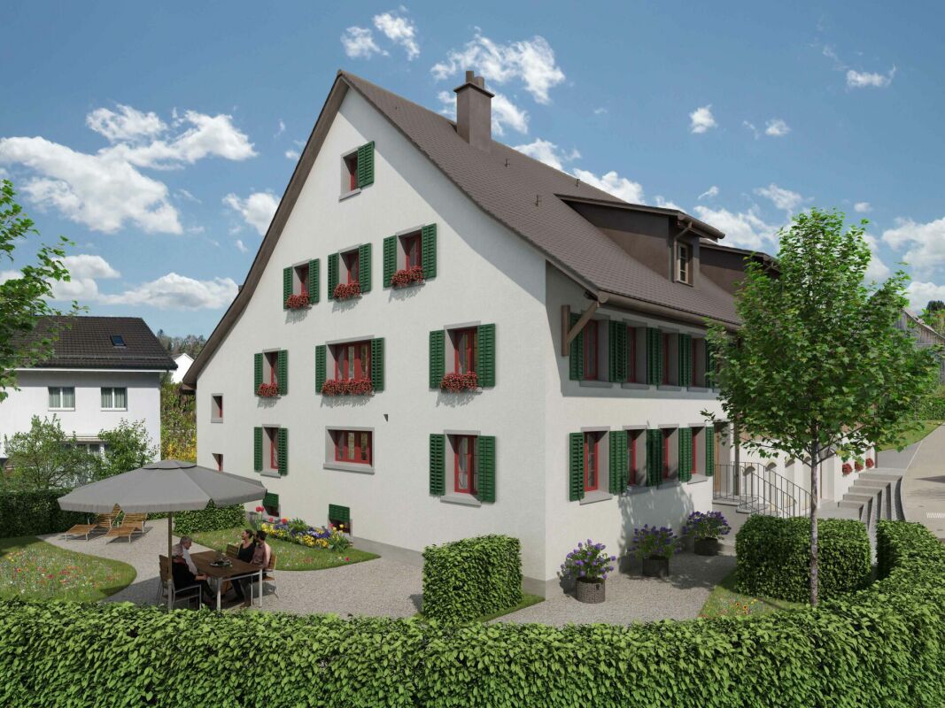 Traditionelles Einfamilienhaus mit Garten