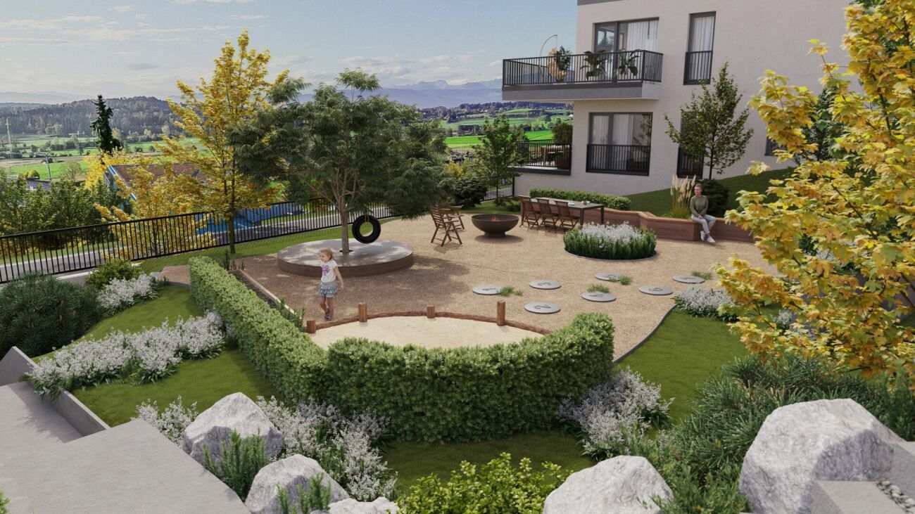 Garten mit Terrasse und Wohnanlage