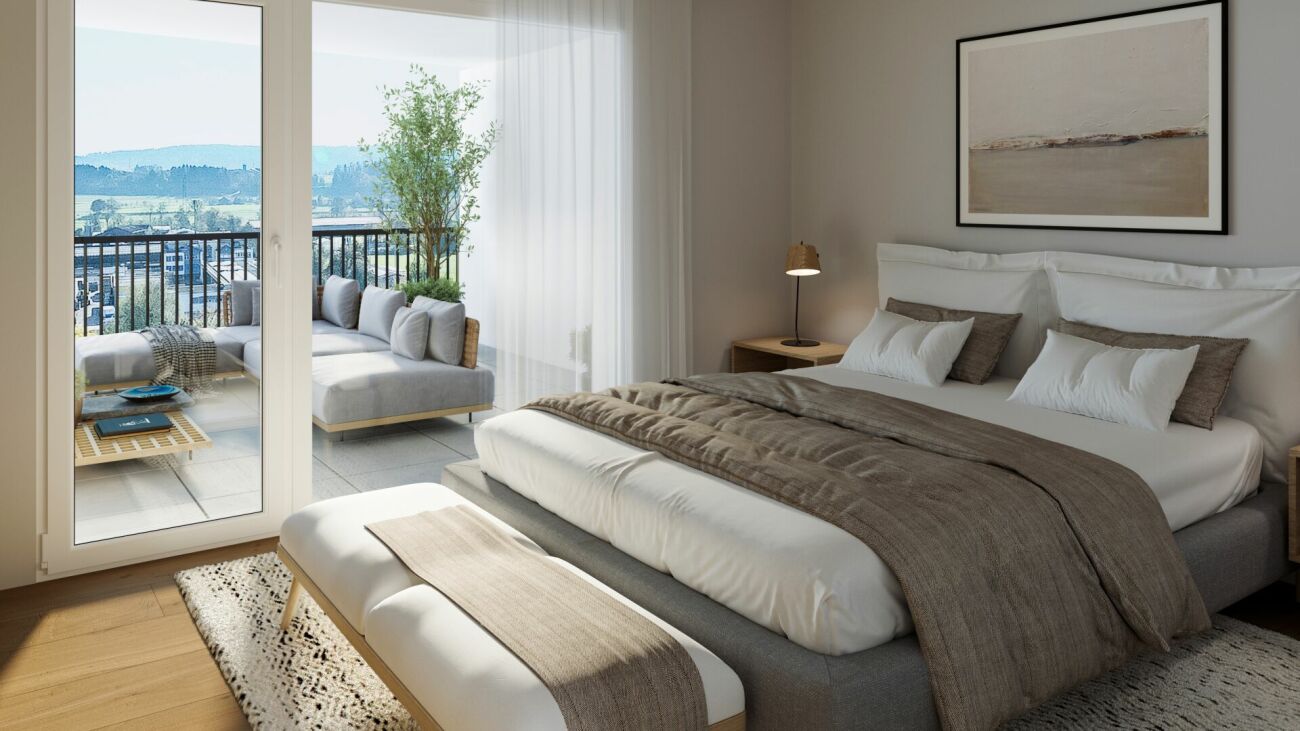 Helles Schlafzimmer mit Balkonblick
