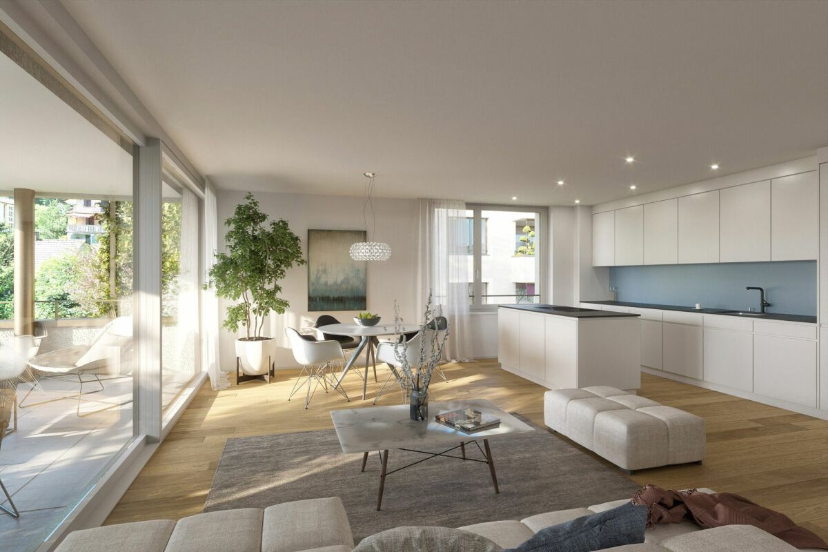 Offener Wohn-Ess-Küchenbereich mit Terrasse