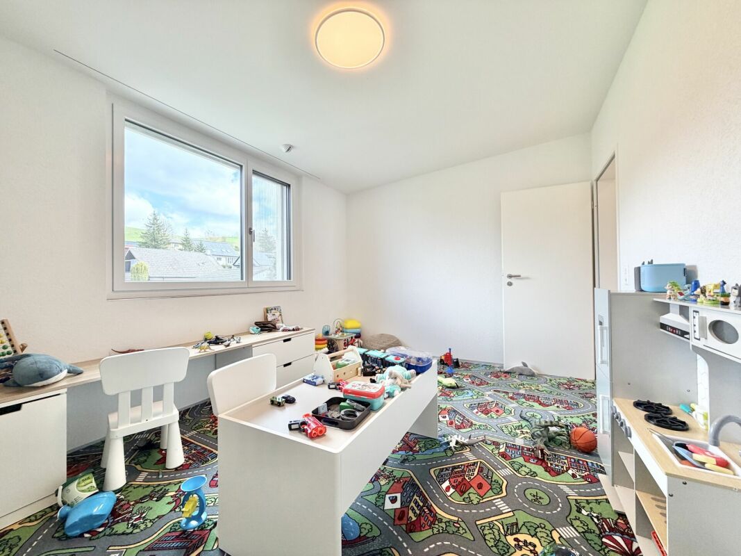 Kinderzimmer mit Spielbereich