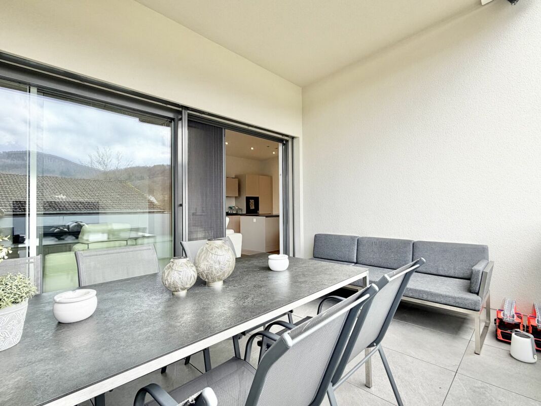 Überdachte Terrasse mit Sitzgruppe