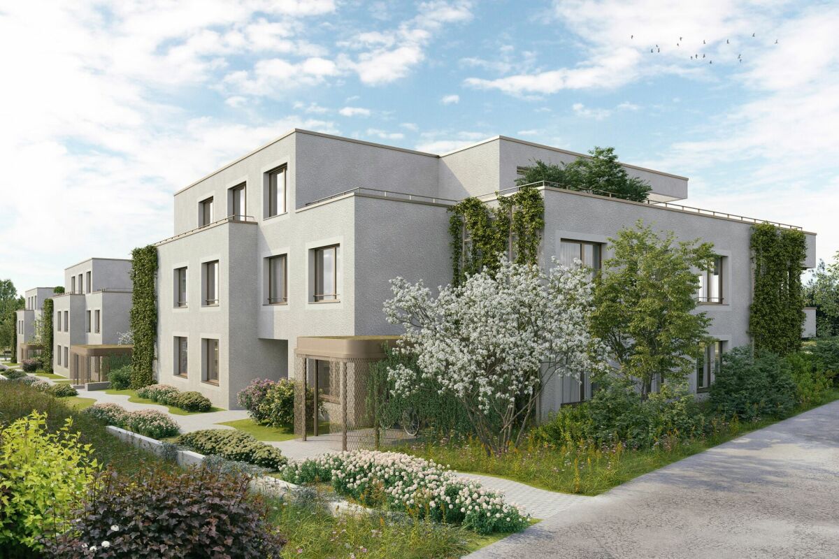 Moderne Wohnanlage mit begrünten Außenanlagen