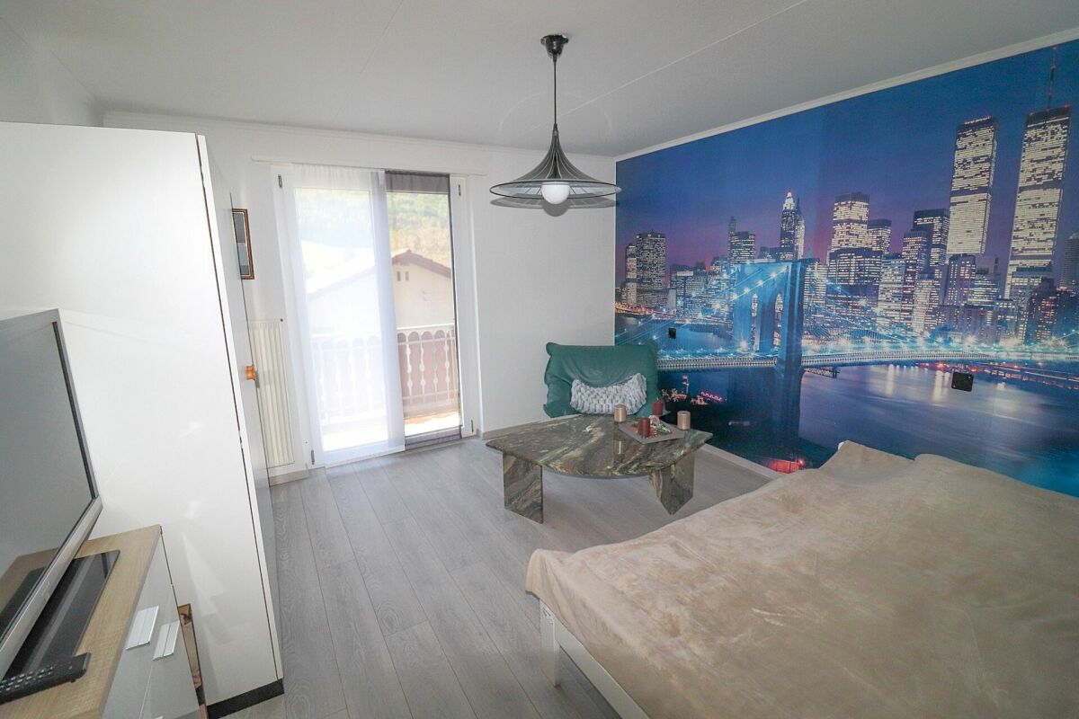 Schlafzimmer mit City-Wandbild