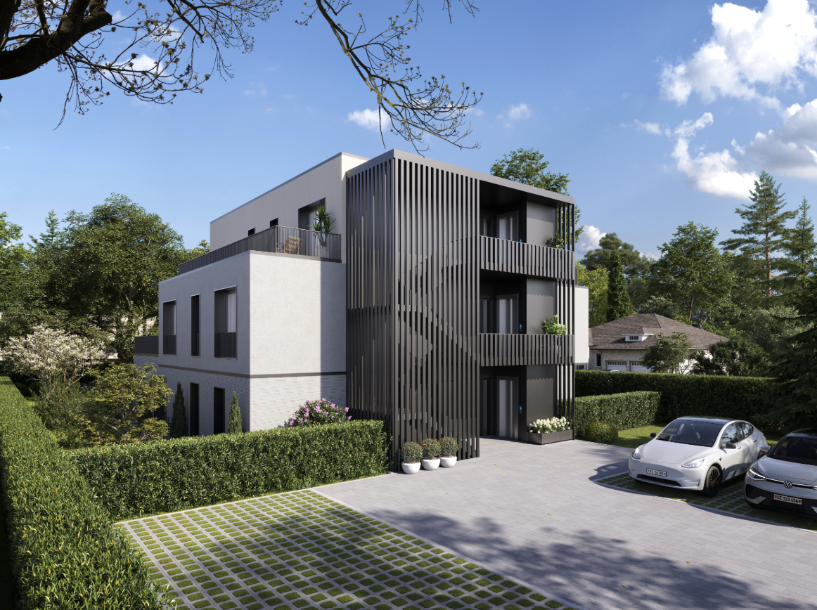 Modernes Mehrfamilienhaus mit Balkonen und Stellplätzen