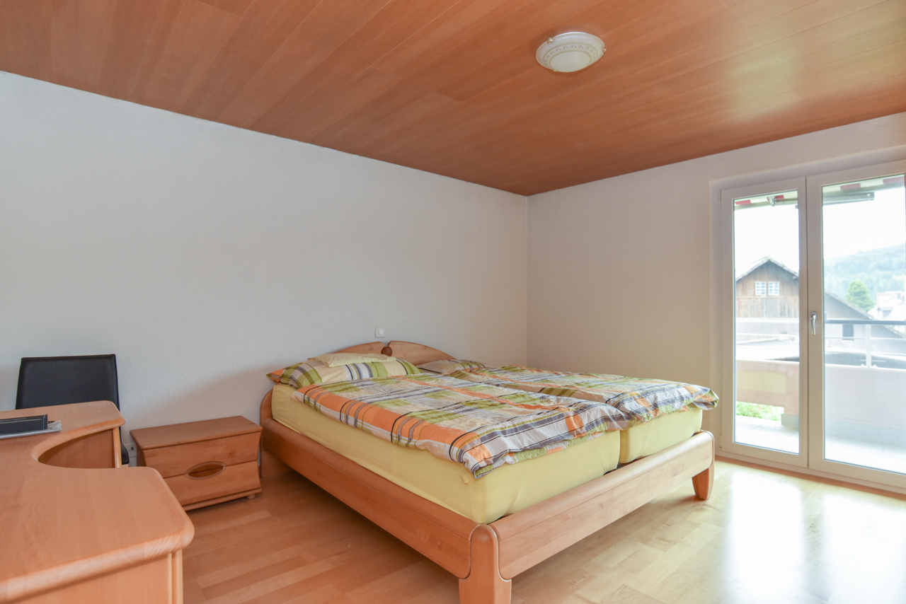Schlafzimmer mit Balkonzugang