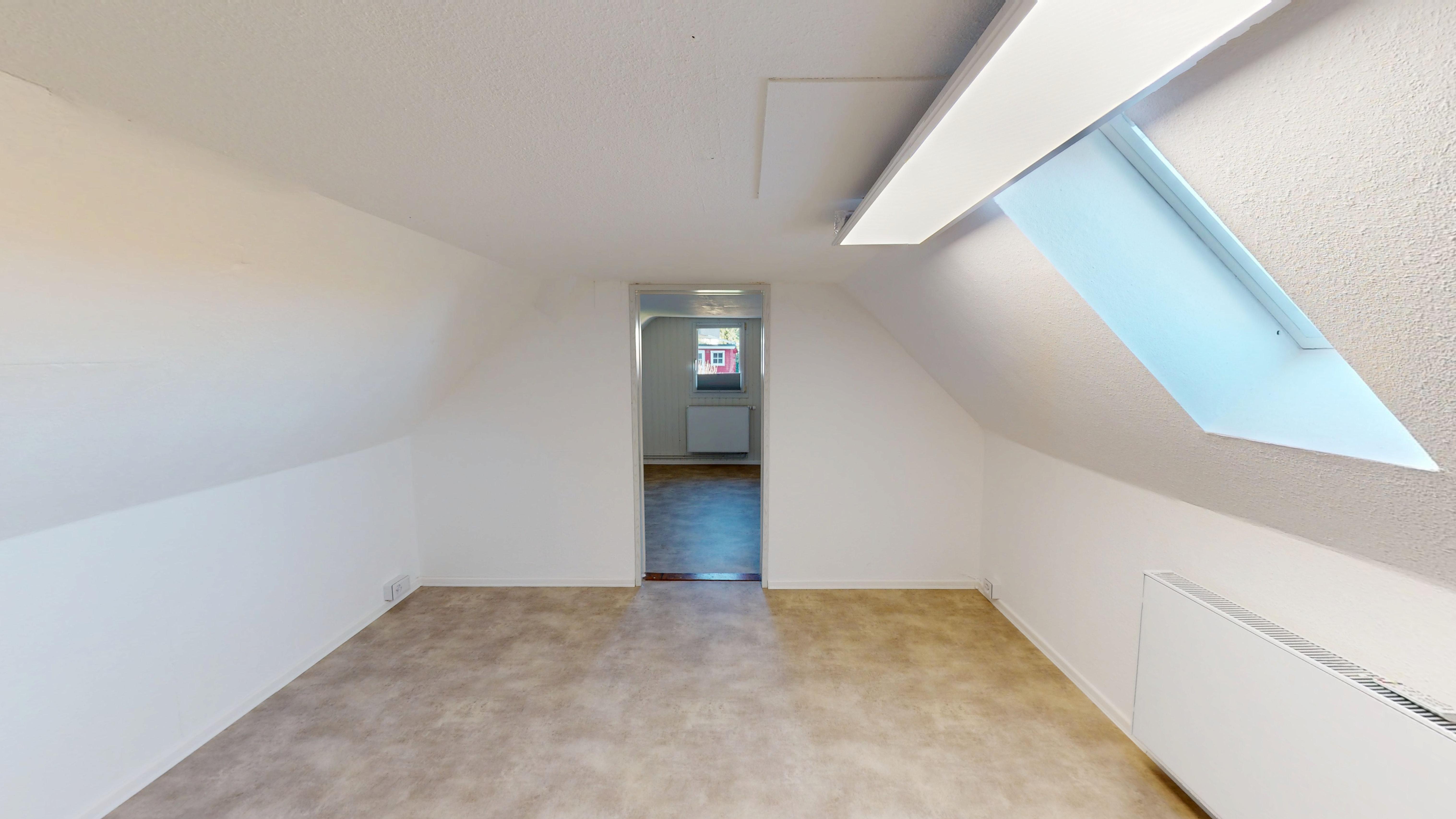 Dachgeschosszimmer mit Schrägen