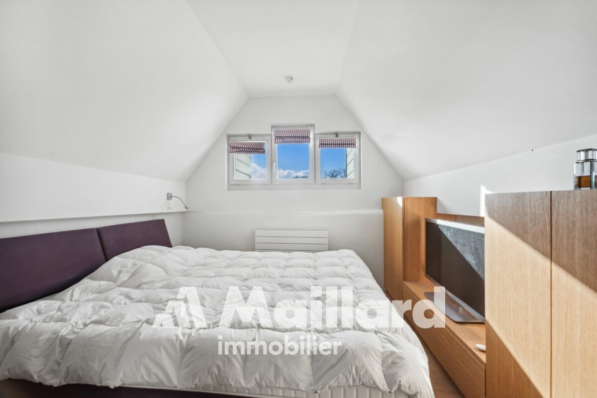 Dachgeschoss-Schlafzimmer mit Dachfenstern