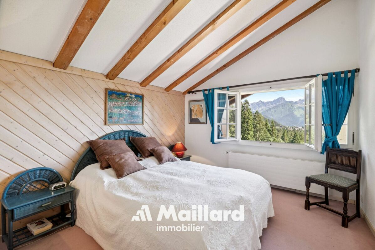 Gemütliches Schlafzimmer mit Bergblick