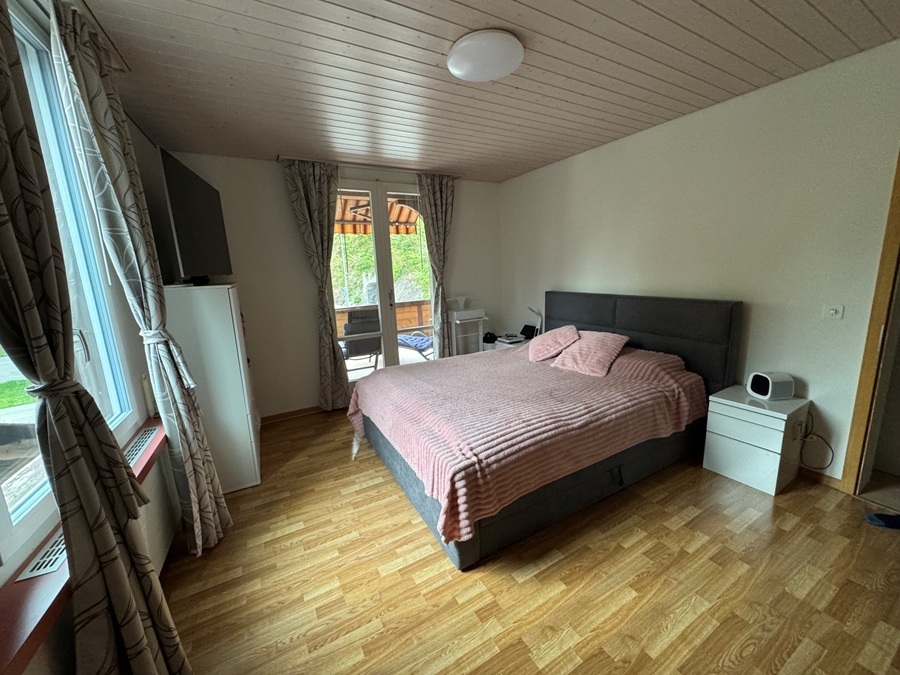 Schlafzimmer mit Balkonzugang
