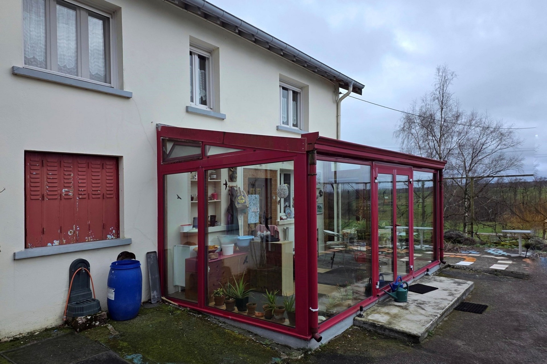 Haus mit verglastem Wintergarten