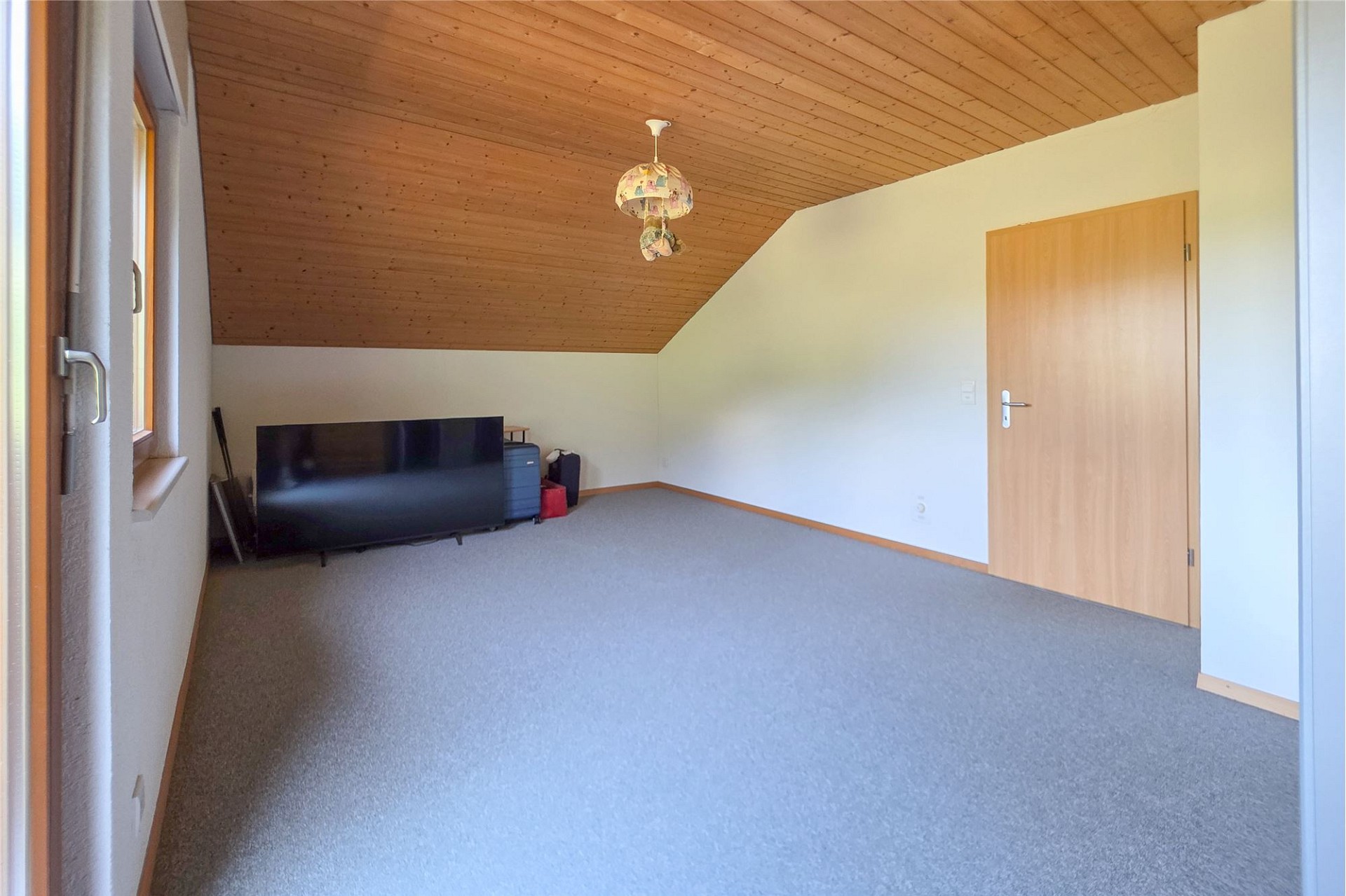 Ausgebauter Dachraum mit Dachschräge