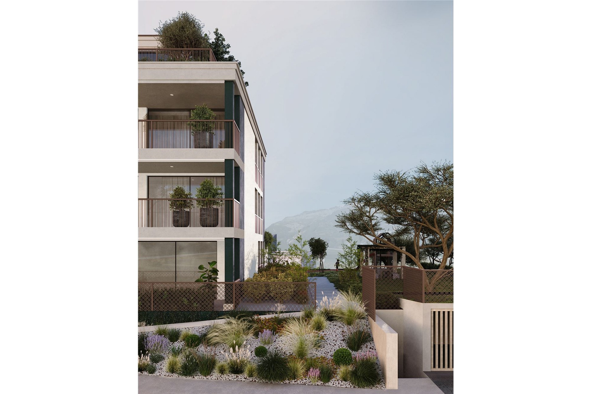 Modernes Wohngebäude mit Balkon und Gartenanlage