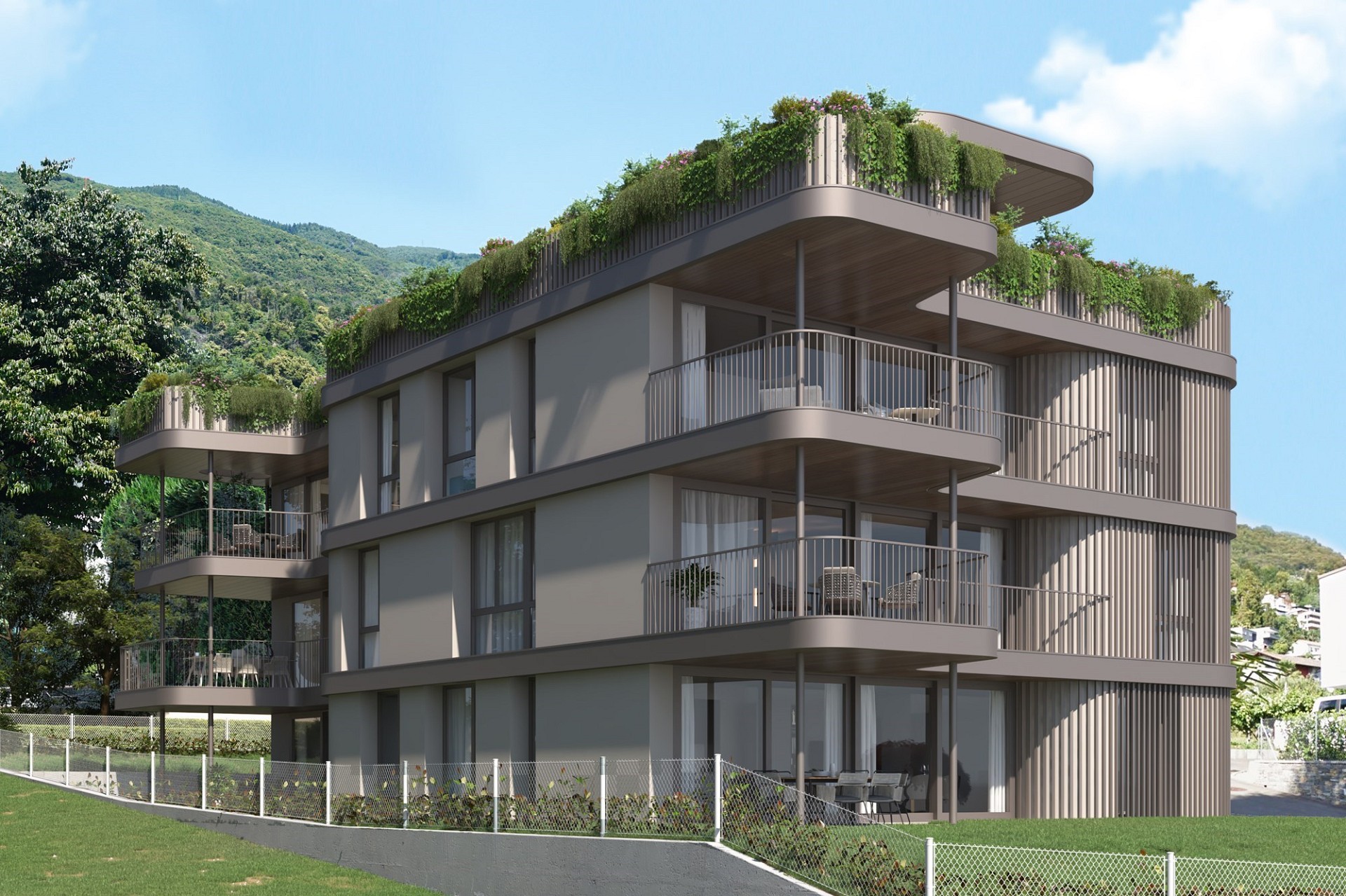 Modernes Mehrfamilienhaus mit begrünten Terrassen