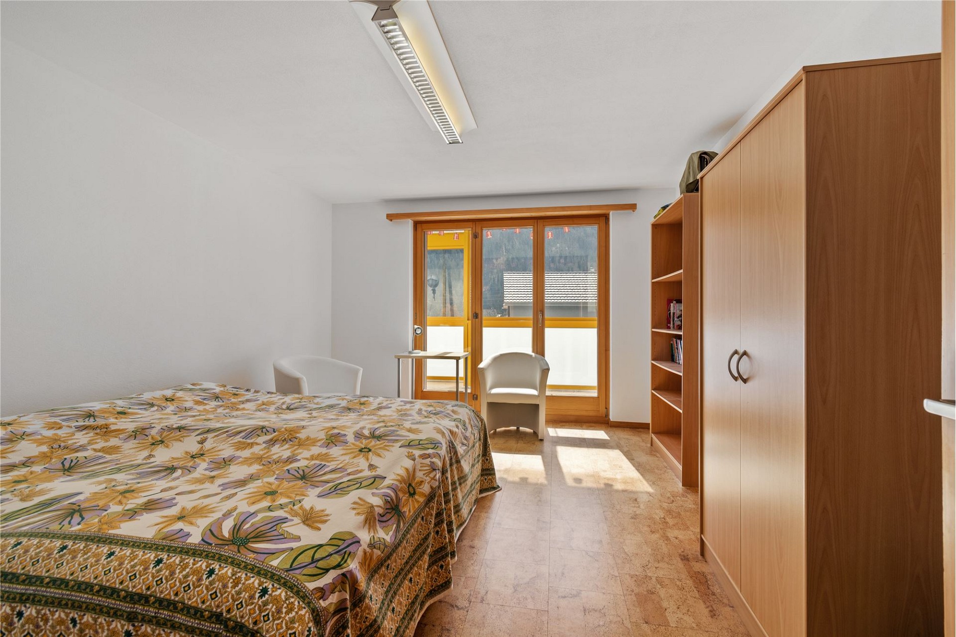 Schlafzimmer mit Balkonzugang