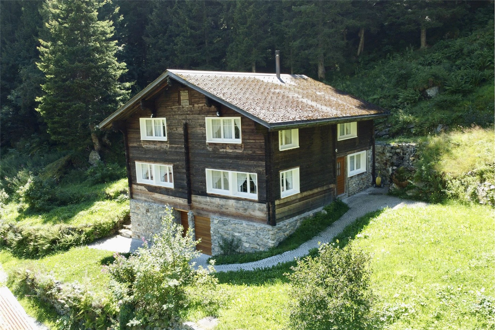 Rustikales Chalet in Waldlage