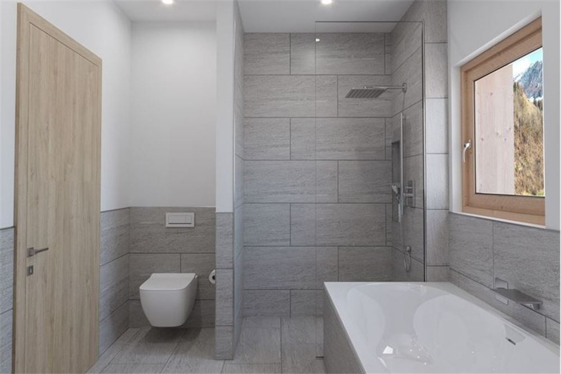 Modernes Badezimmer mit Badewanne und WC