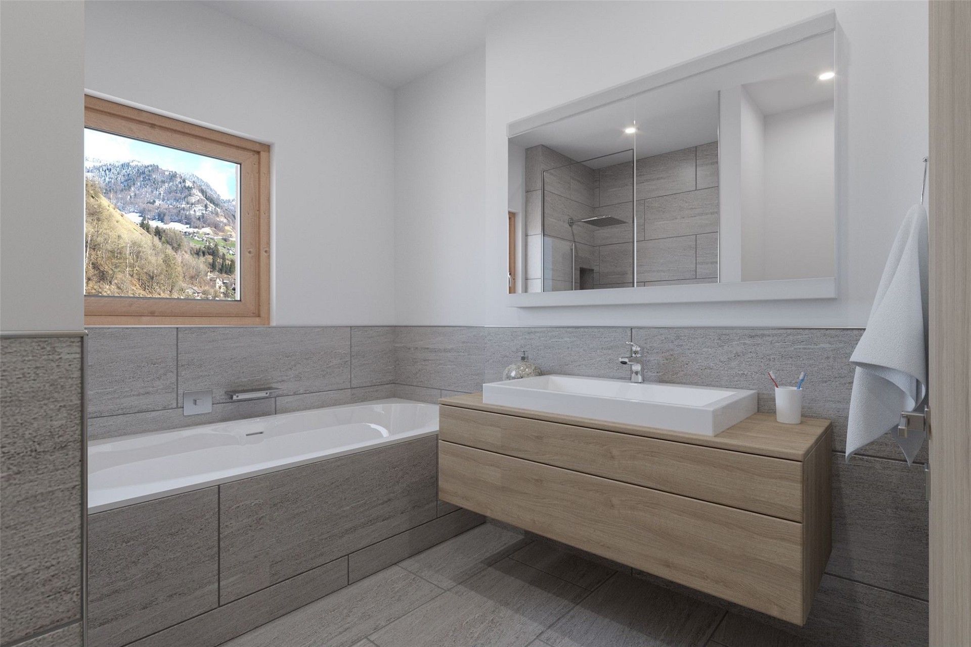 Modernes Badezimmer mit Badewanne und Bergblick