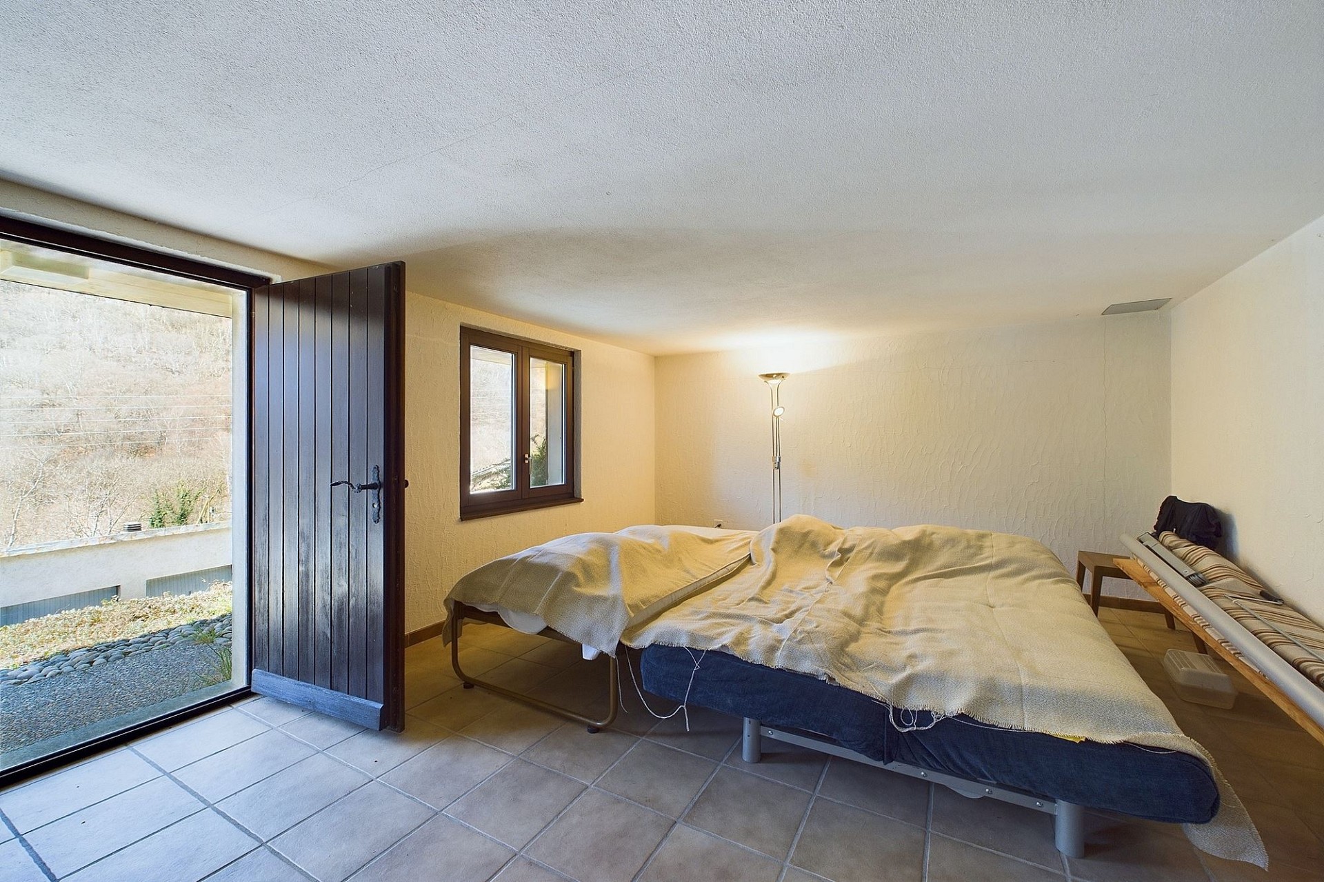 Schlafzimmer mit Terrassentür