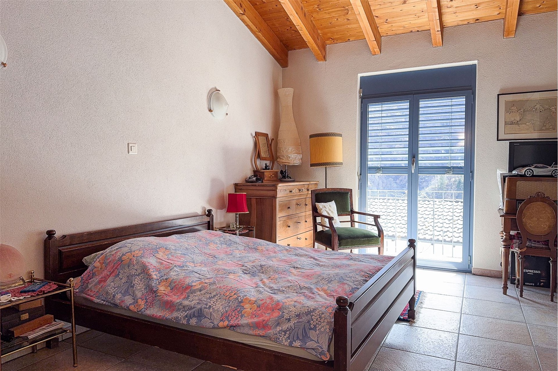 Schlafzimmer mit Balkonzugang