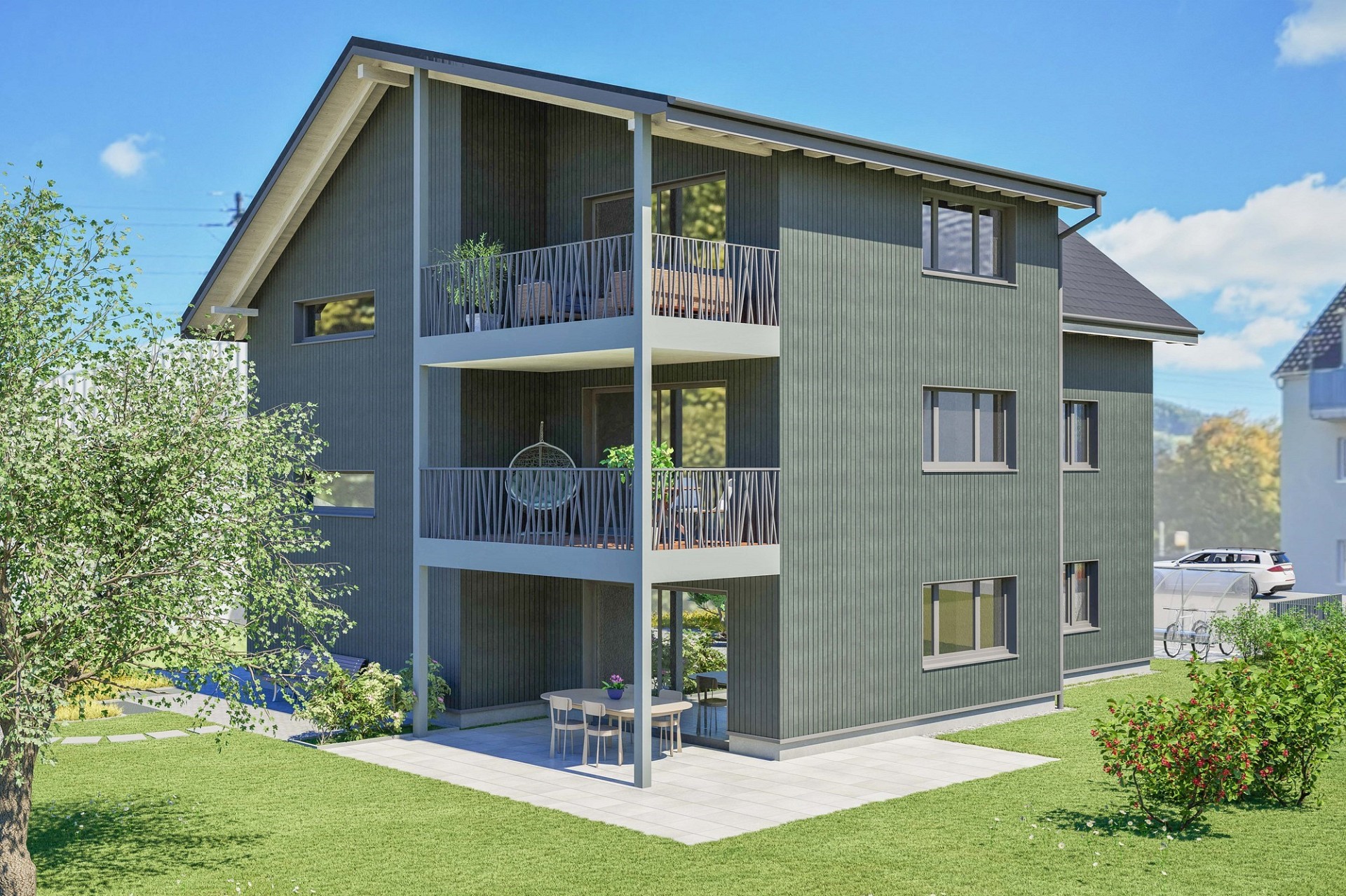 Modernes Mehrfamilienhaus mit Balkonen und Garten
