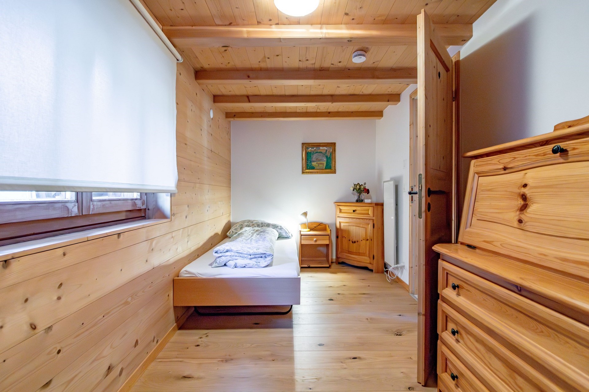 Gemütliches Schlafzimmer in Holzoptik