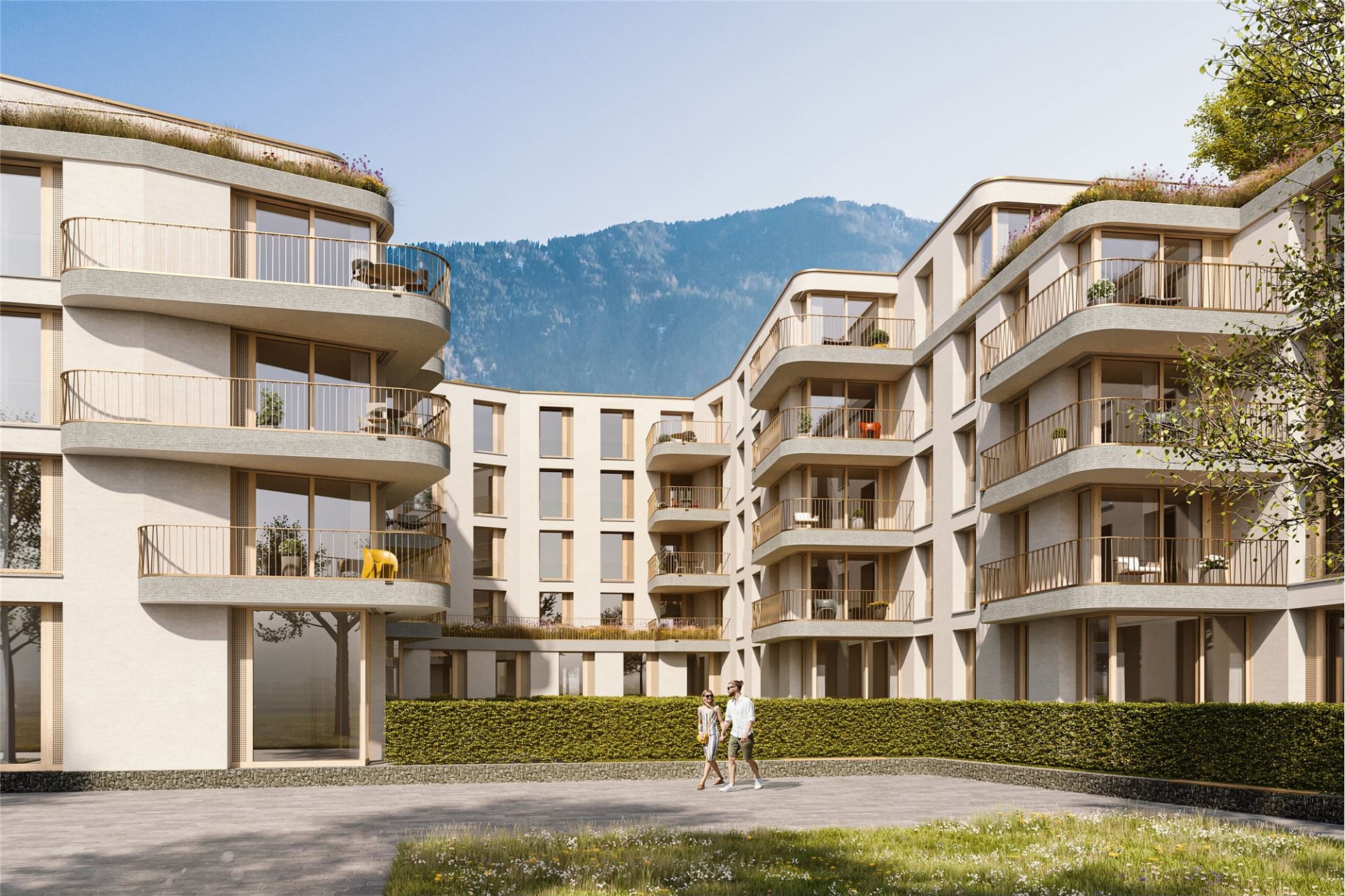 Modernes Wohnensemble mit Balkonen und Bergblick
