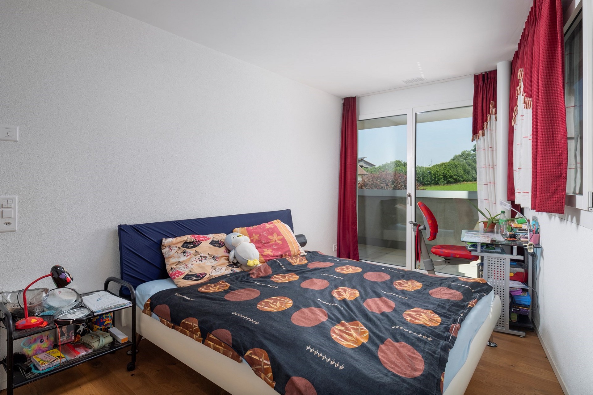 Schlafzimmer mit Balkonzugang