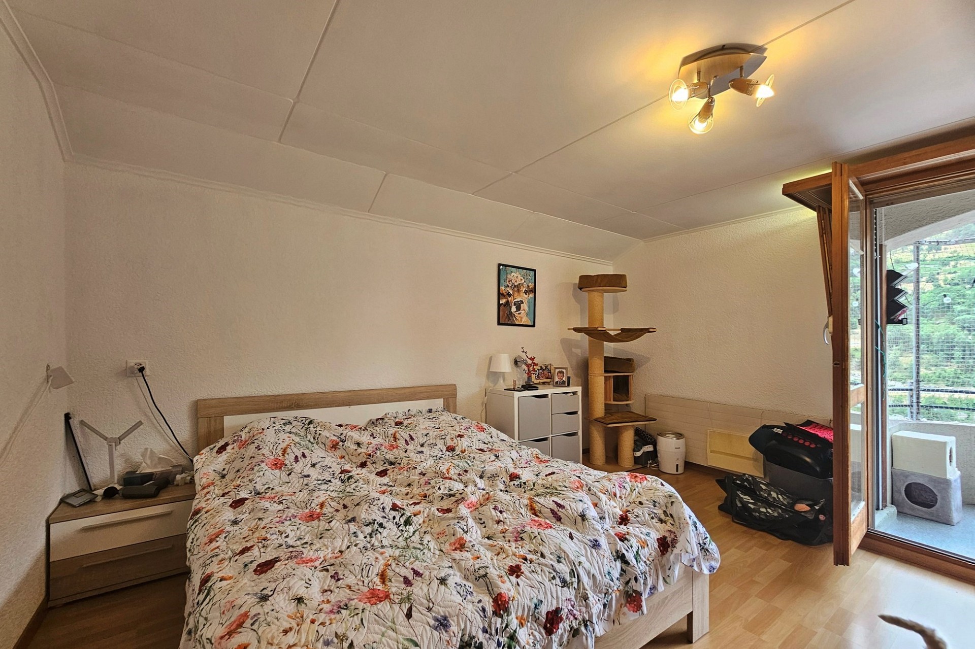 Schlafzimmer mit Balkonzugang