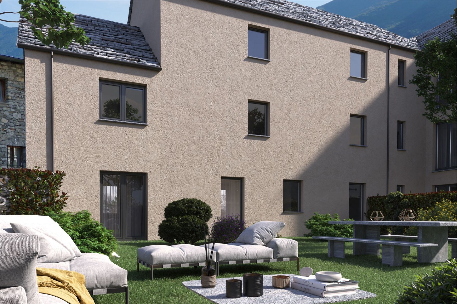 Beiges Wohnhaus mit Gartenlounge