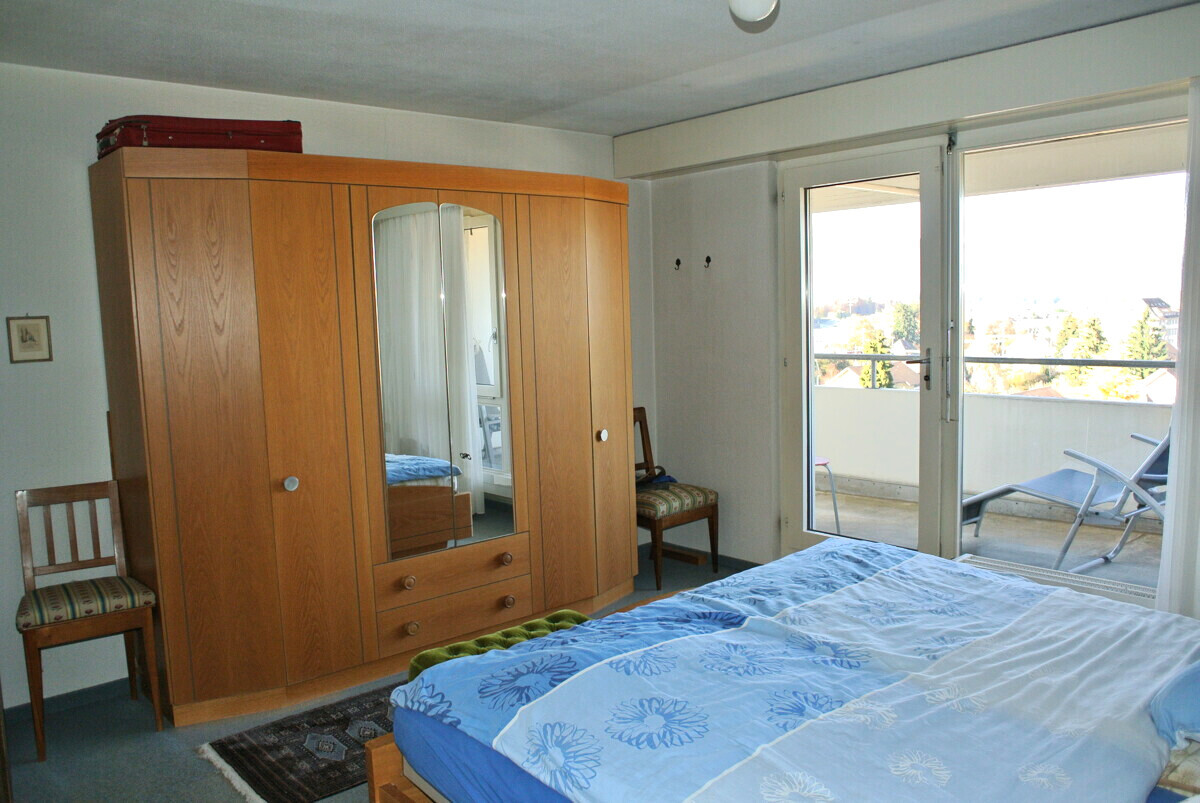 Schlafzimmer mit Balkonzugang