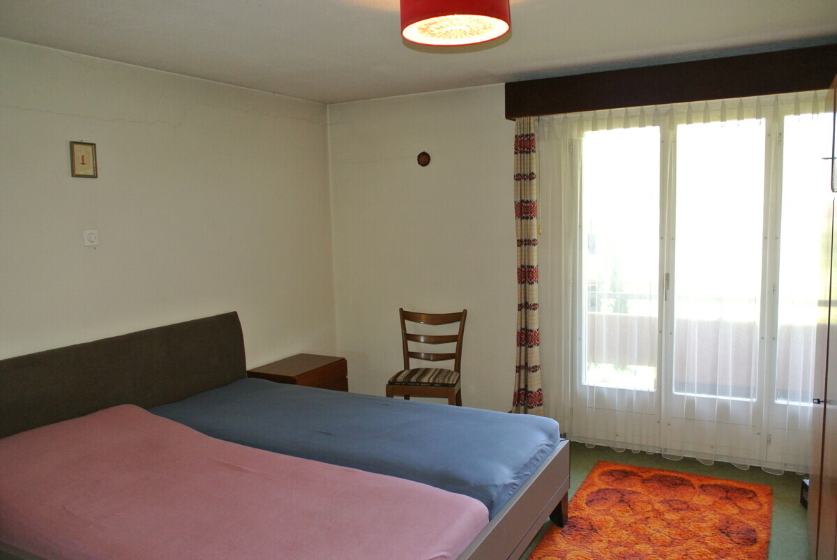 Schlafzimmer mit Balkonzugang