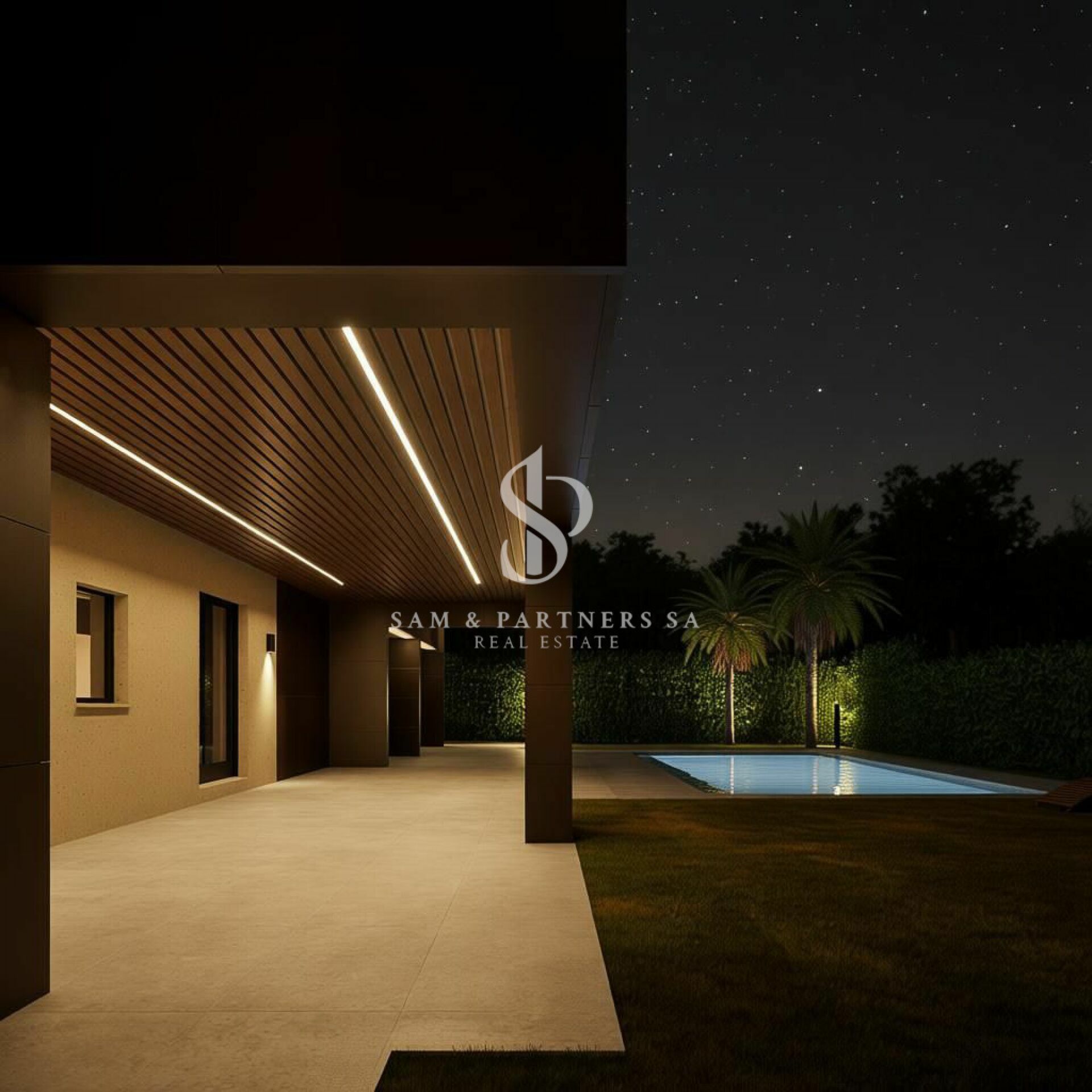 Modernes Haus mit Pool bei Nacht