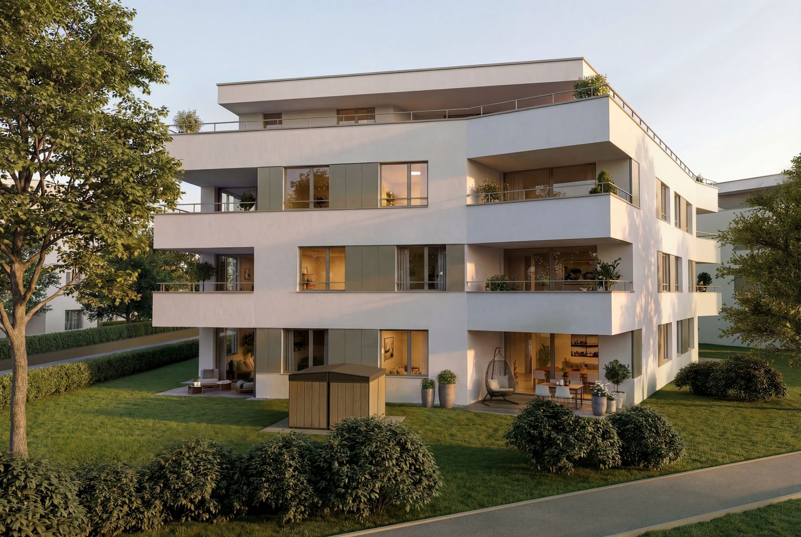 Modernes Mehrfamilienhaus mit Garten und Terrassen