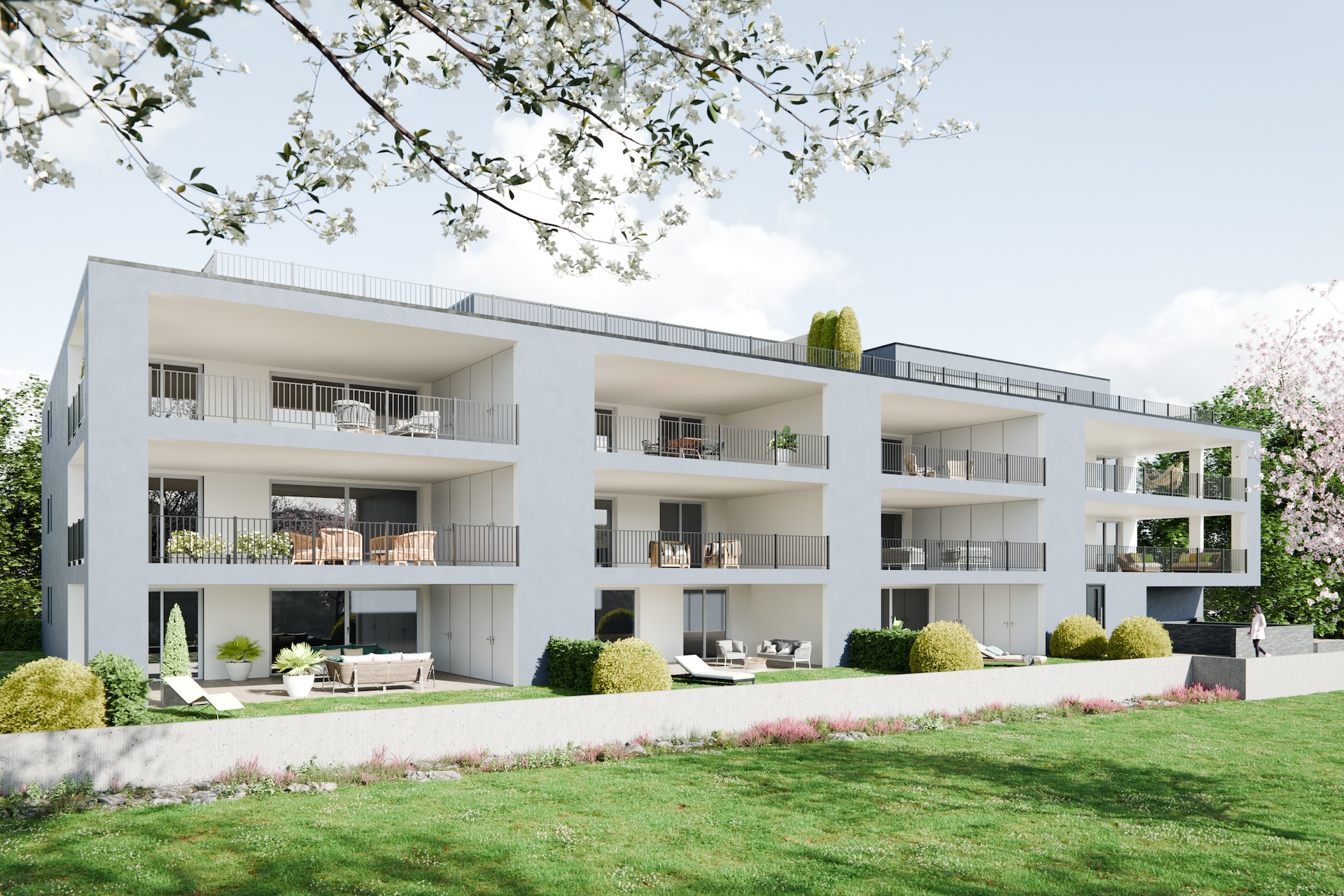 Moderne Wohnanlage mit Balkonen und Garten
