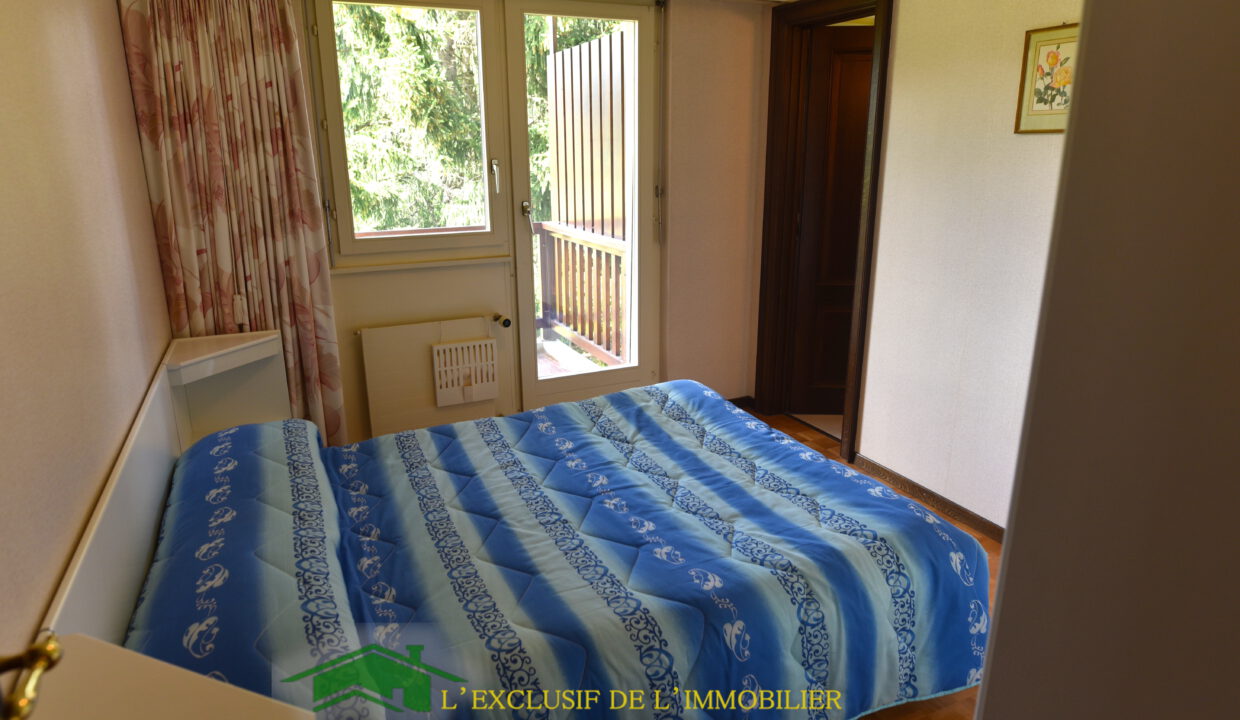 Schlafzimmer mit Balkonblick