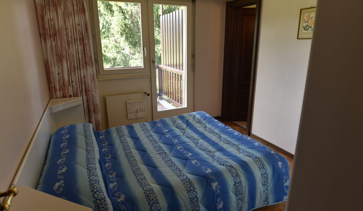 Schlafzimmer mit Balkonzugang