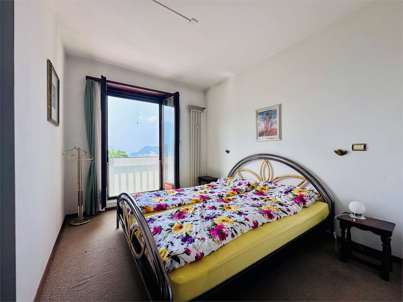 Schlafzimmer mit Balkonzugang