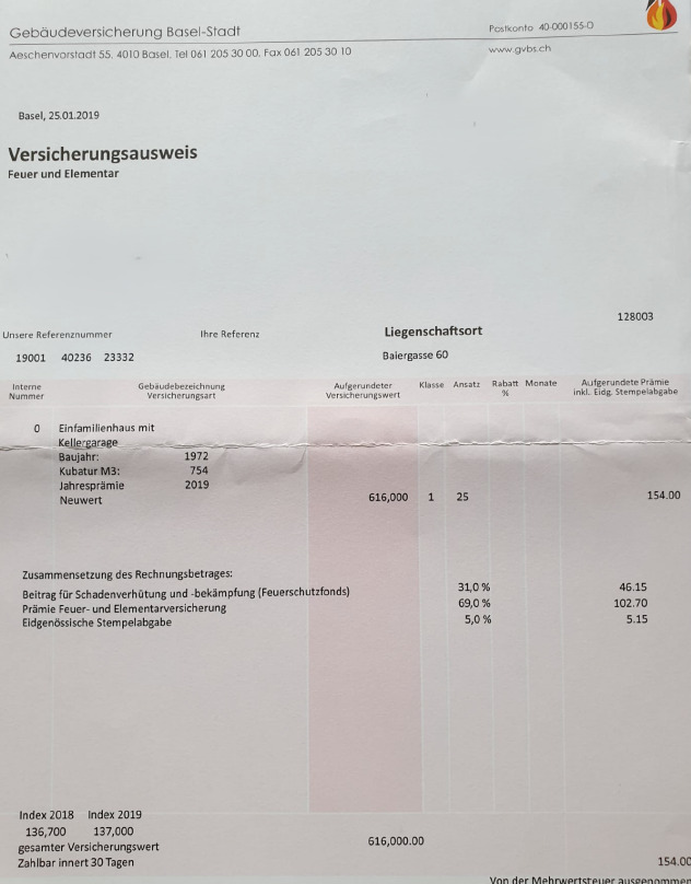 Versicherungsdokument mit Hausangaben