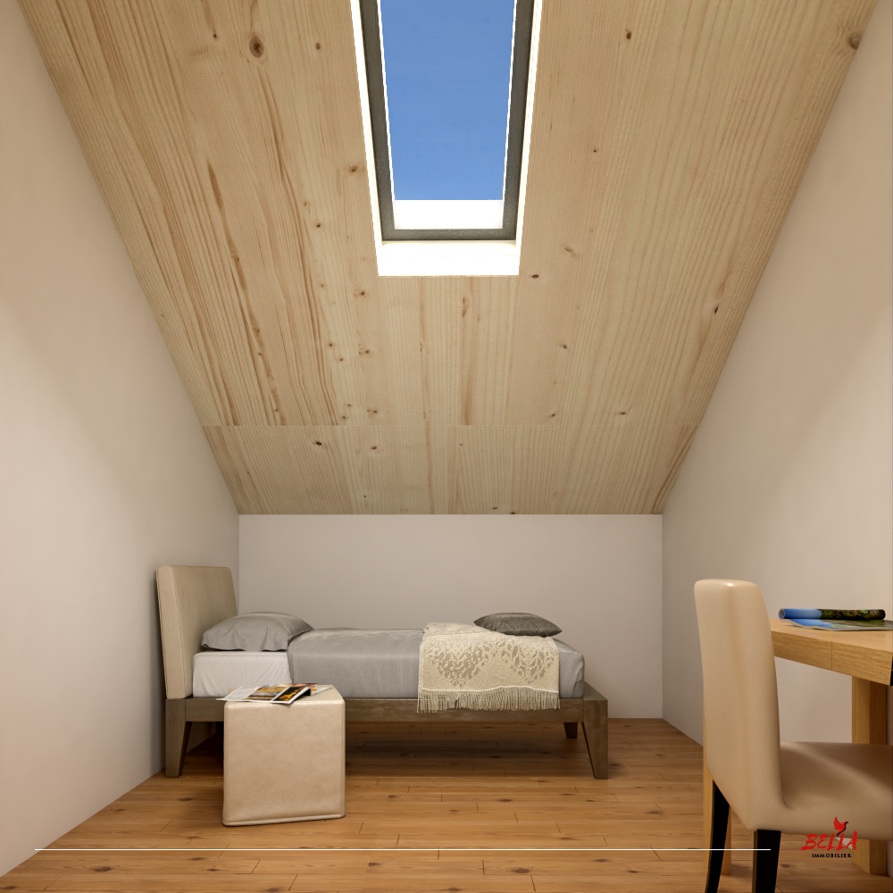 Dachzimmer mit Einzelbett und Dachfenster