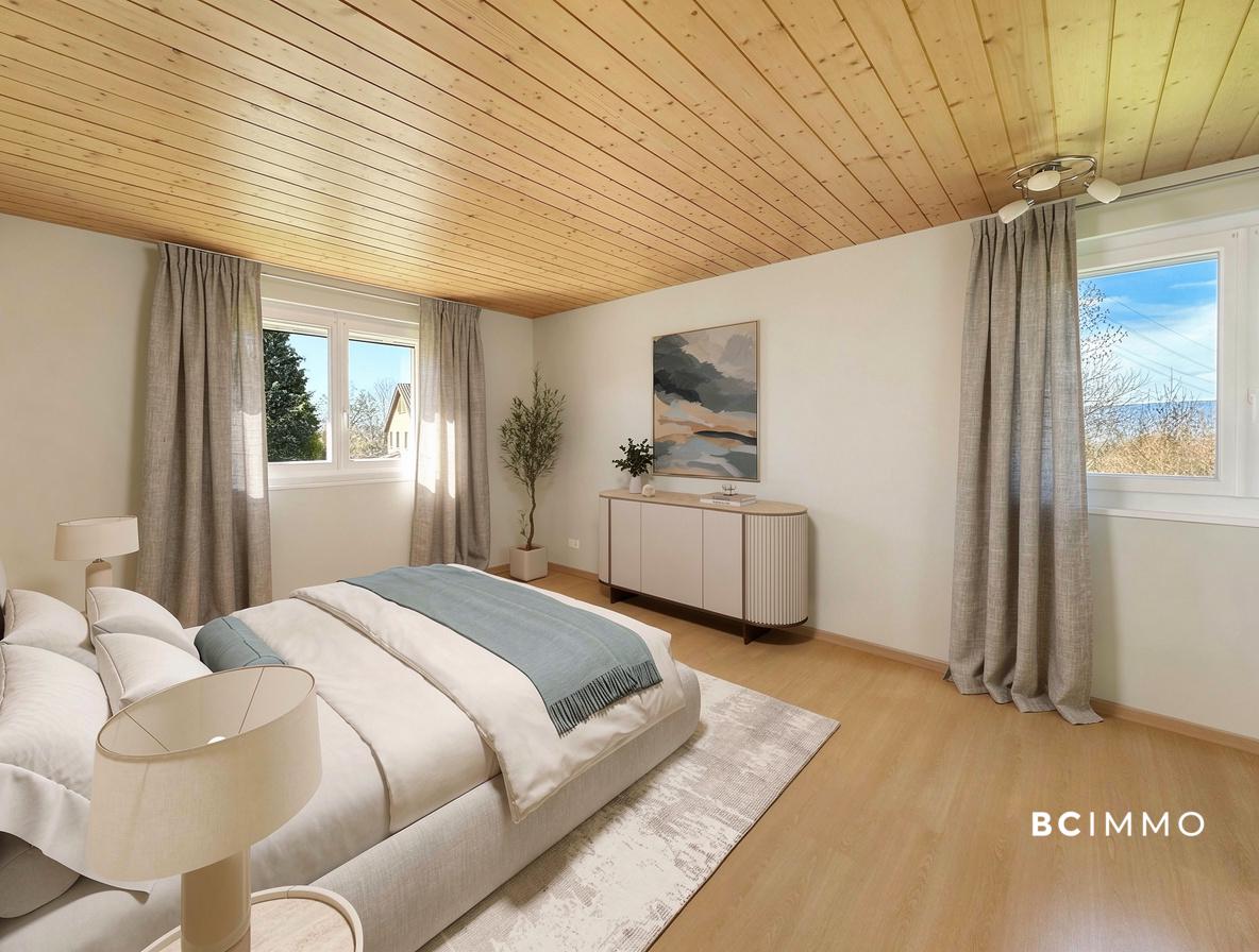 Helles Schlafzimmer mit Holzdecke