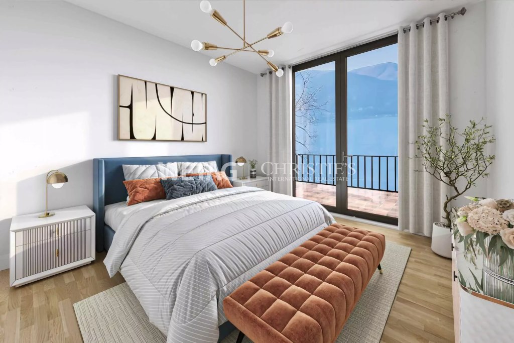 Schlafzimmer mit Seeblick und Balkon