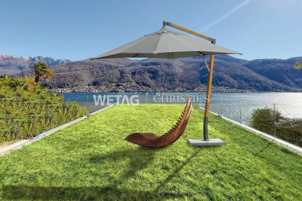 Seeblick mit Lounge im Garten