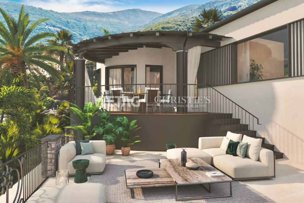 Terrasse mit Sitzbereich und Bergkulisse