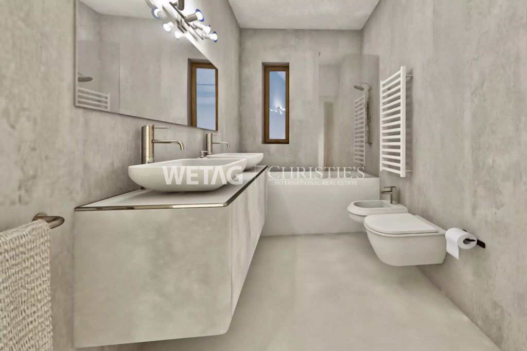 Modernes Badezimmer mit Doppelwaschtisch und wandhängendem WC