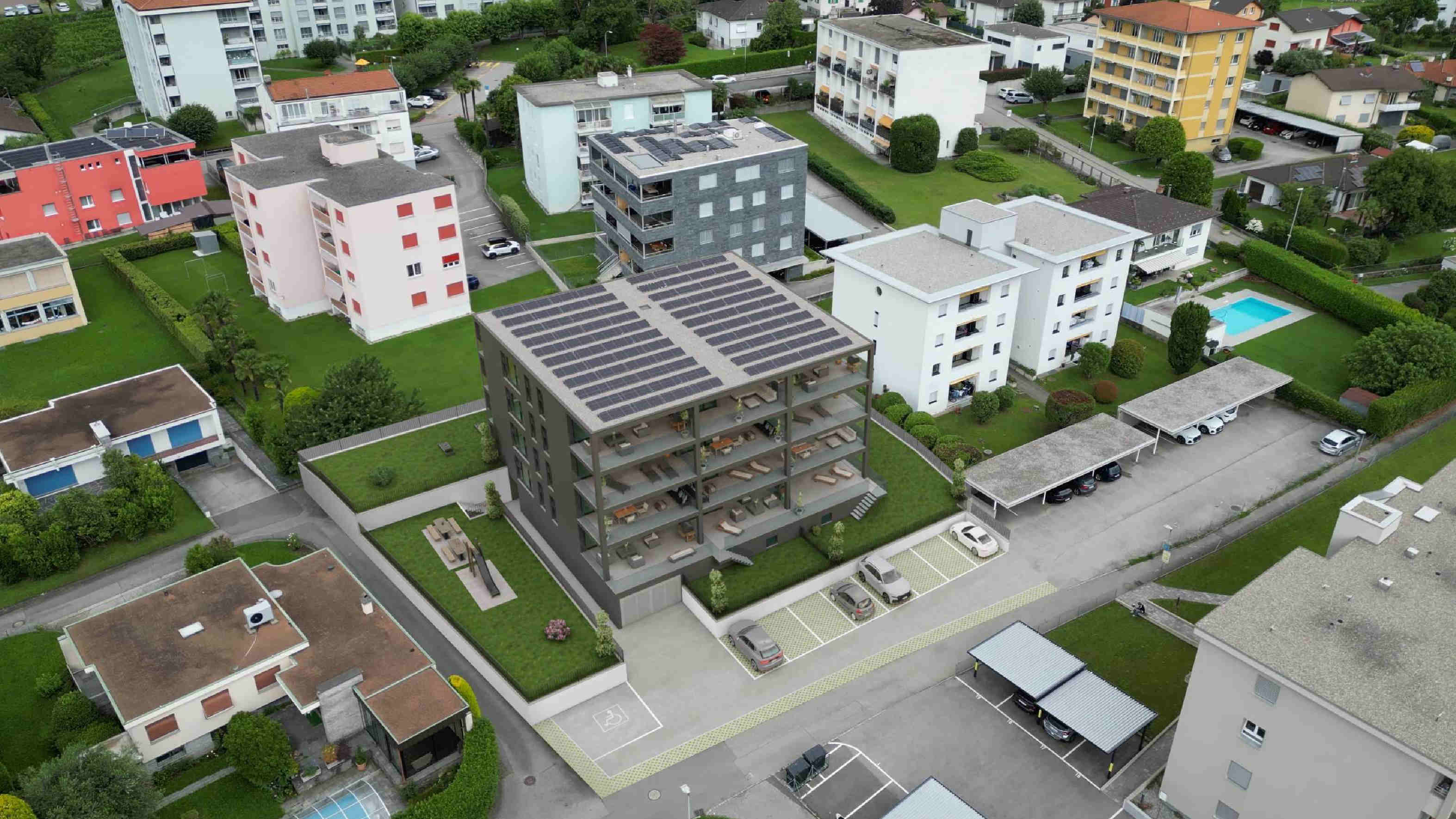 Luftaufnahme einer Wohnanlage mit Solardach