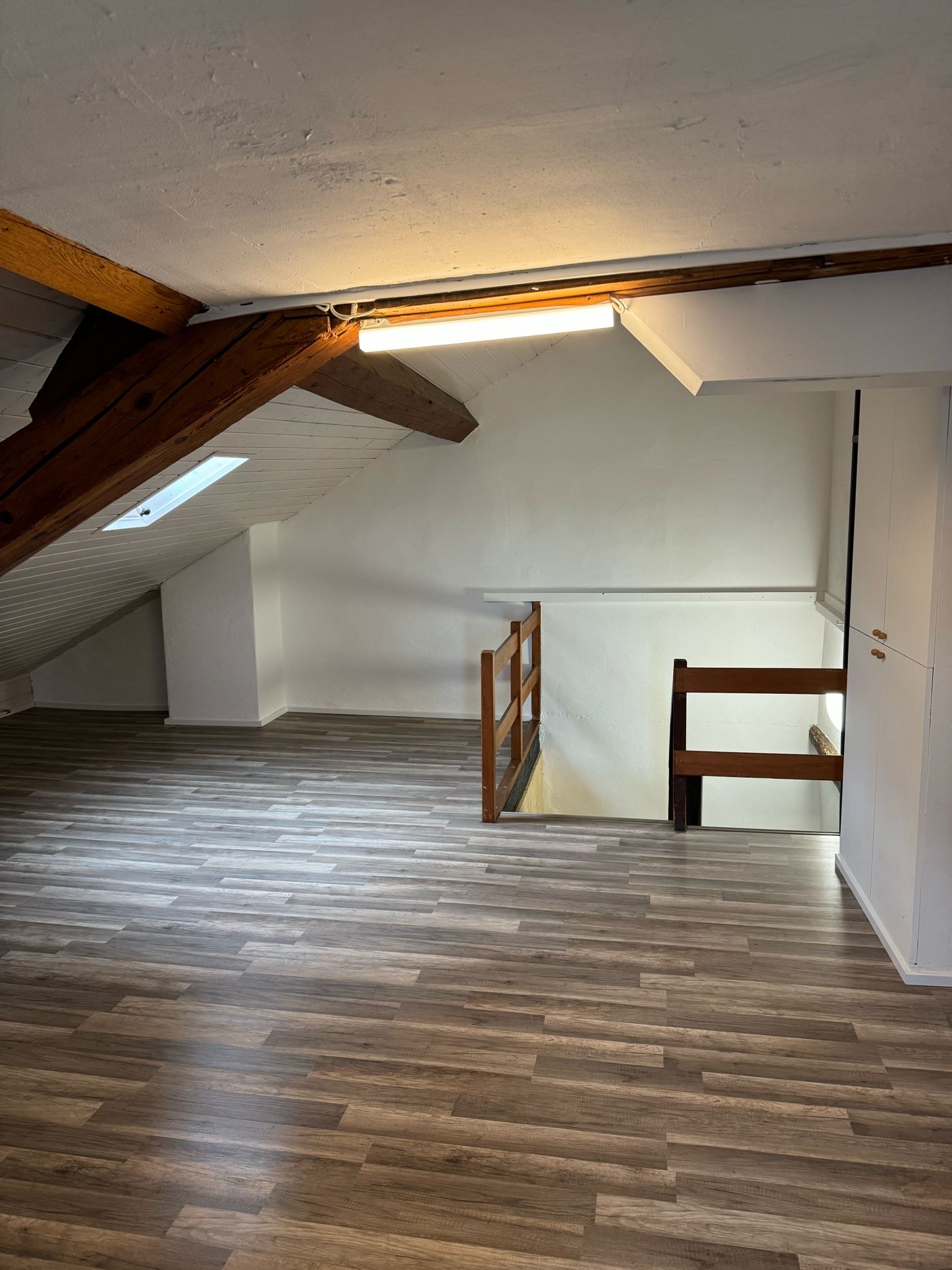 Dachgeschossraum mit Treppenaufgang